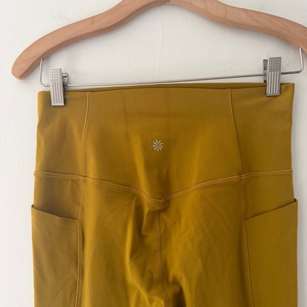 Athleta Leggings Salutation Stash Mustard Yellow Gold Pockets Size Small